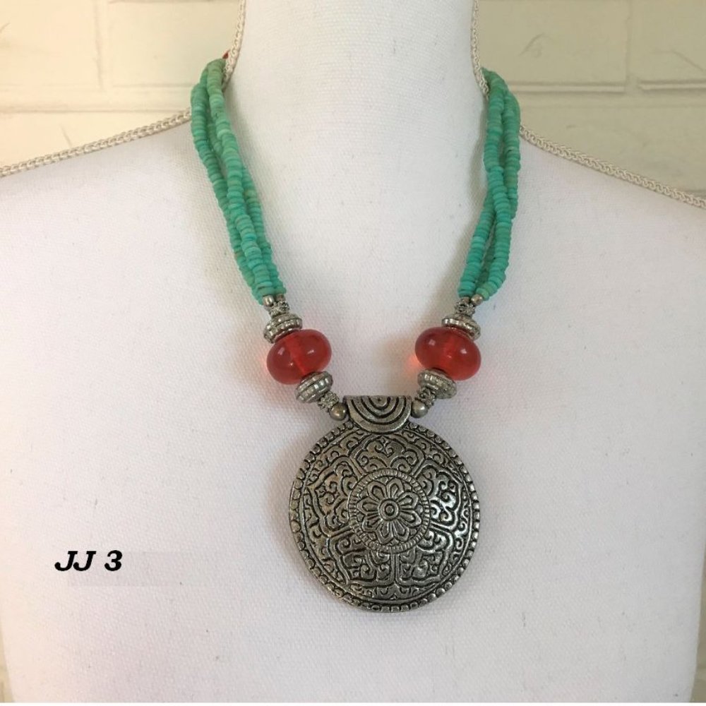 Vintage looking medallion on beaded necklace